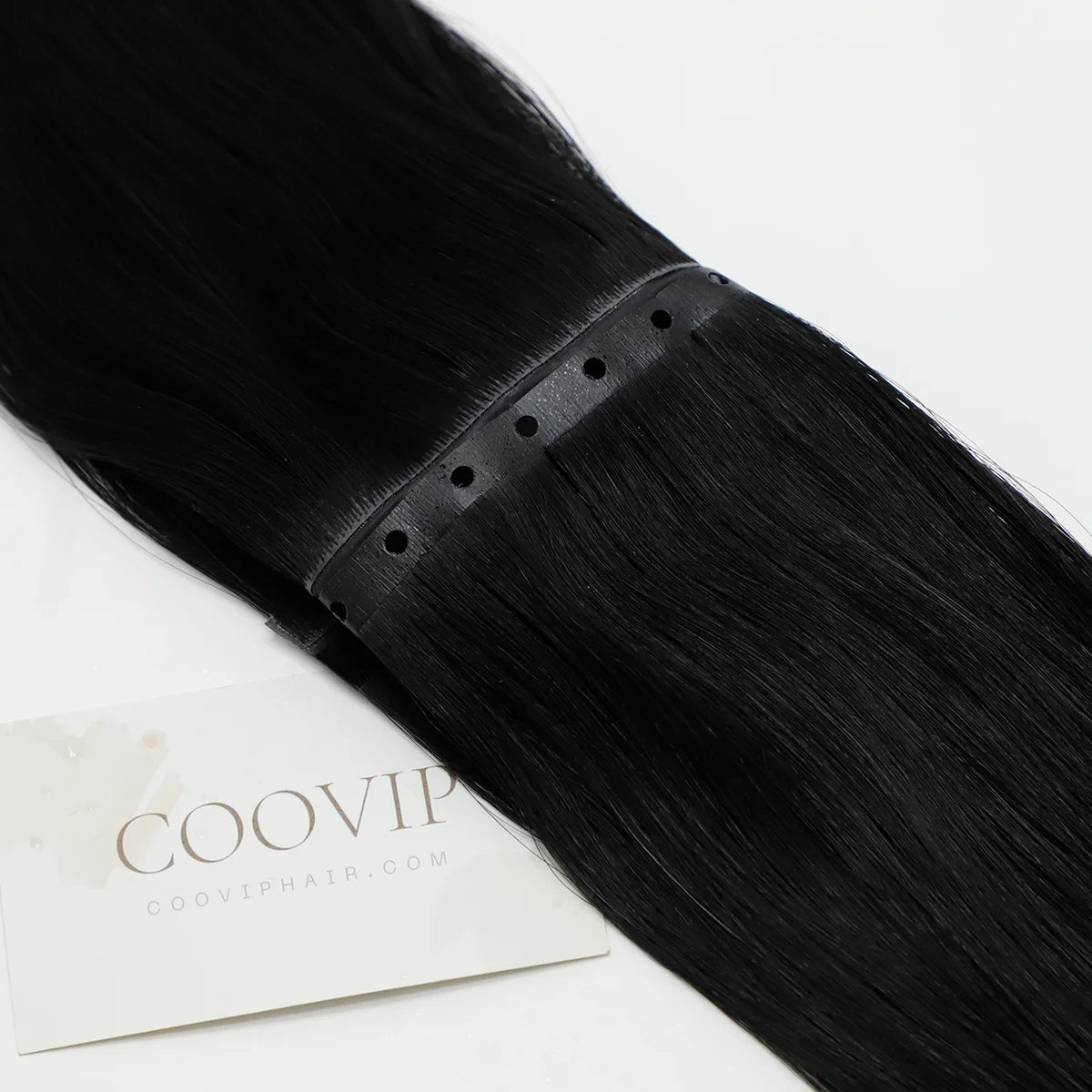 Seamless and glue-free micro-bead installation of Virgin Remy Butterfly Weft extensions.